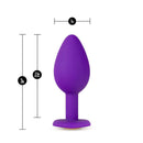 Temptasia Bling Plug Small Purple measures 3 inches length and 1 inch width, made of platinum cured silicone with gold faux gemstone.