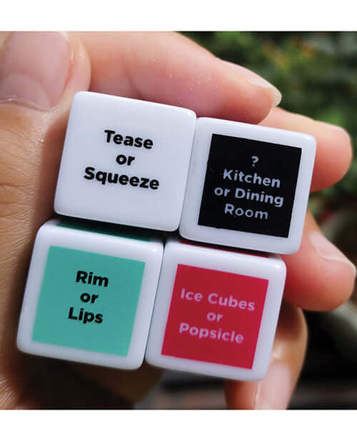 Four dice with playful instructions for a fun and interactive game experience.