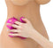 Hand using pink Roller Balls Massager Glove on bare back