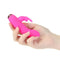 Hand holding Power Bullet 10-Function Vibrating Bullet with pink bunny-shaped removable silicone sleeve for dual stimulation.