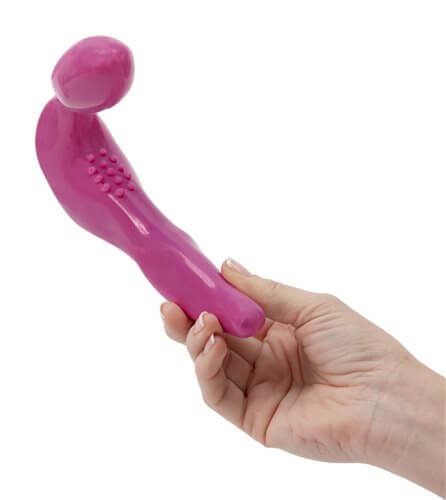 Rechargeable pink strapless strap-on vibrator held in a hand, designed for stimulating multiple erogenous zones.