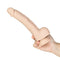 Hand holding the Naked Addiction Tristan 9-inch realistic silicone dildo with lifelike design and balls.