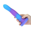 Blue and purple glow in the dark dildo from the Rave Addiction collection being held in a hand.
