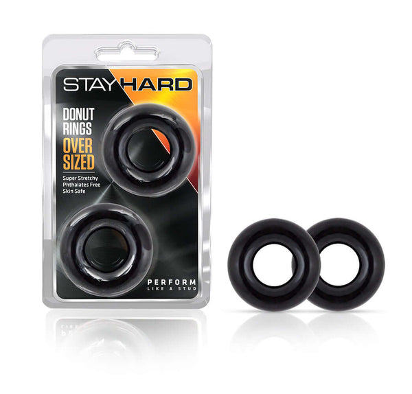 Blush Novelties Stay Hard Oversized Donut Rings Black Elastomer Cock Rings Package and Product Display