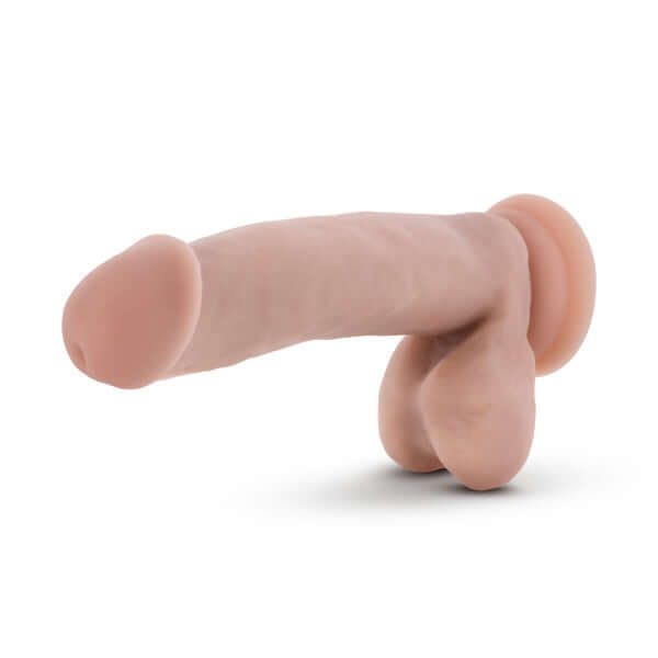 Realistic tan 7 inch dildo with balls by Dr. Skin, featuring a sturdy suction cup base, lifelike veins, and textured surface.