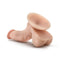 Dr. Skin Dr. Stephen 6.5-inch beige dildo with balls and suction cup base from Blush Novelties laying on a white background