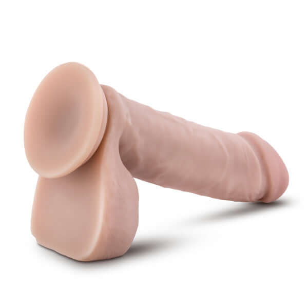 Dr. Skin Dr. William 8 inches Dildo with Balls in beige light skin tone from Blush Novelties, featuring a sturdy suction cup base.