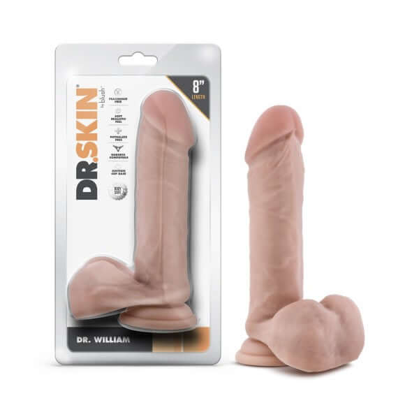Dr. Skin Dr. William 8 inches Dildo with Balls in beige light skin tone, featuring a sturdy suction cup base, in packaging and out.