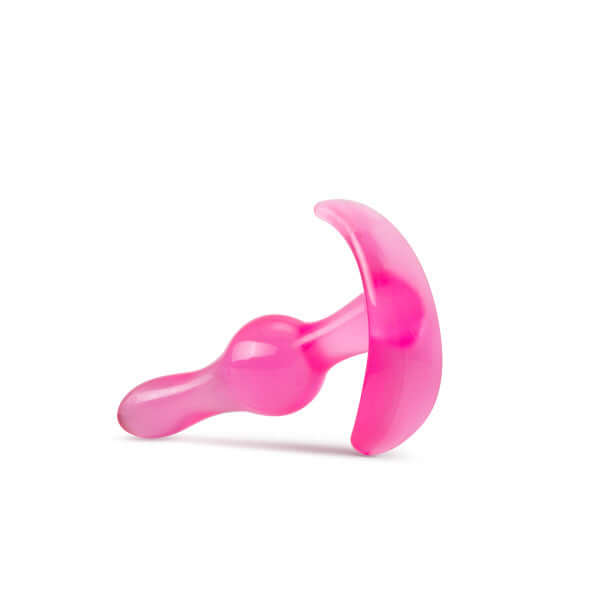 Pink curvy anal plug with ergonomic base from Blush Novelties, perfect for beginners.