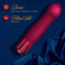 Oh My Gem Classy Garnet Red Vibrator with rounded end on blue fabric, showcasing Luxuria platinum-cured silicone and Ultrasilk smooth finish