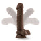 Dark brown Dr. Skin Plus 9-inch posable dildo with balls, showing flexible shaft in different positions.