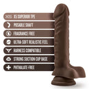Dr. Skin Plus 9 inch posable dildo in dark brown with label features: X5 Superior TPE, Poseable Shaft, Fragrance Free, Harness Compatible, Suction Cup Base
