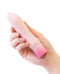 Oh My Gem Elegant Morganite Pink Vibrator with rounded end and pleasure waves held in hand for self-care and exploration.