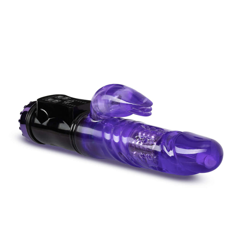 Purple Flutter Rabbit Vibrator with reversible gyrating shaft and clitoral pleaser from Blush Novelties, made of soft TPE material.