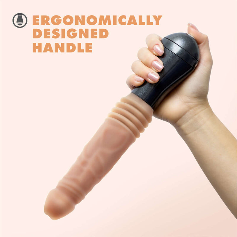 Hand holding Blush Novelties Dr. Knight 10.5-inch thrusting vibrating dildo with ergonomically designed handle.