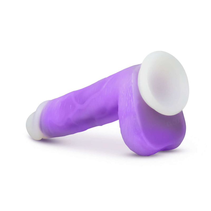 Neo Elite Encore 8 inches Vibrating Dildo in vibrant purple, featuring a realistic design with a suction cup base for versatile use.