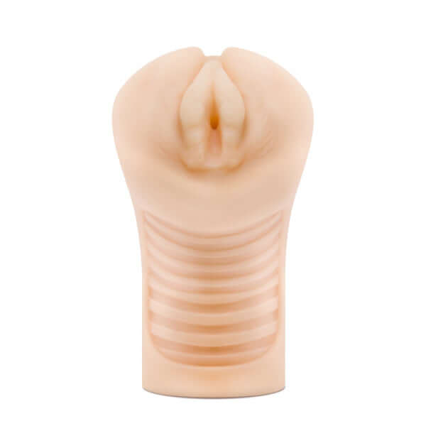 M Elite Soft and Wet Annabella Beige Male Masturbator with ribbed texture from Blush Novelties for ultimate pleasure and fantasy.