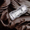 M for Men Soft and Wet Magnifier Clear Stroker on black satin sheets