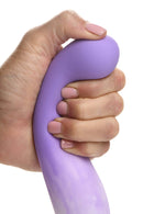 Hand holding Simply Sweet Slim G-Spot Silicone Dildo from Curve Novelties in purple