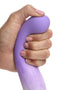 Hand holding Simply Sweet Slim G-Spot Silicone Dildo from Curve Novelties in purple