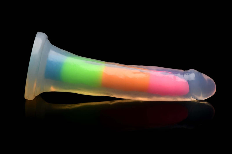 Lollicock 7 inches Glow In The Dark Rainbow Silicone Dildo by Curve Toys on black background