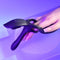 Hand holding a sleek, black, ergonomic adjustable clamp with textured grip and curved edges on a modern surface.