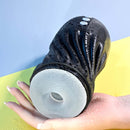 Playboy Solo Stroker with textured spiral motion and 7 speeds held in hand, showcasing innovative design and customizable fit for solo pleasure.
