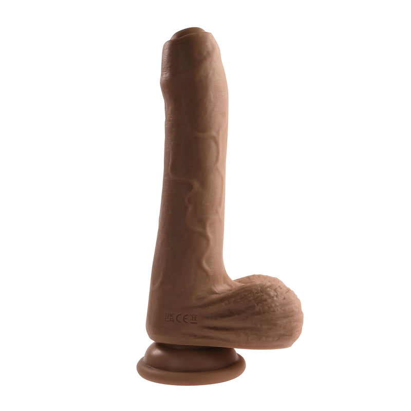 Peek-A-Boo Vibrating Dildo in Dark Skin Tone with Uncircumcised Tip and Powerful Motor for Realistic Pleasure