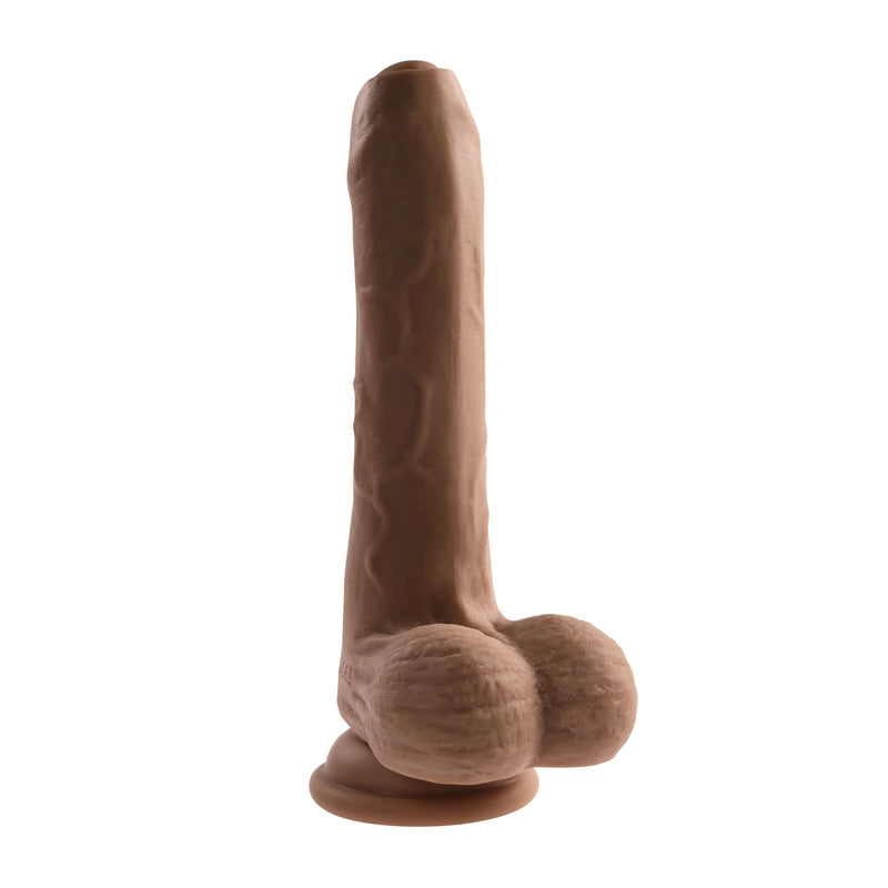 Peek-A-Boo Vibrating Dildo in Dark Skin Tone with realistic design and powerful motor for lifelike pleasure.