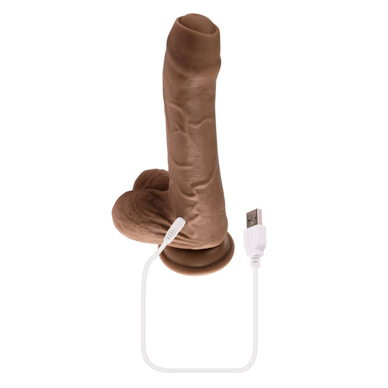 Dark skin tone Peek-A-Boo vibrating dildo with uncircumcised design and USB charging cable