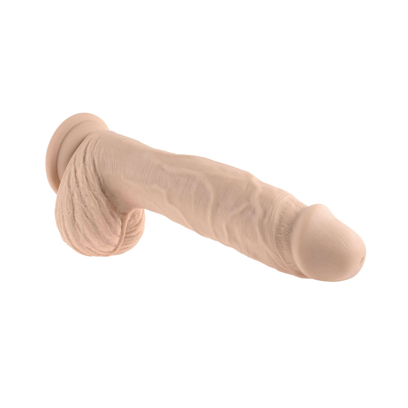 Evolved Full Monty light-skin toned realistic vibrating dildo with remote control featuring lifelike texture.