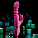 Pink Dragon Rabbit Vibrator among glowing candles, showcasing its elegant design and dual pleasure features.