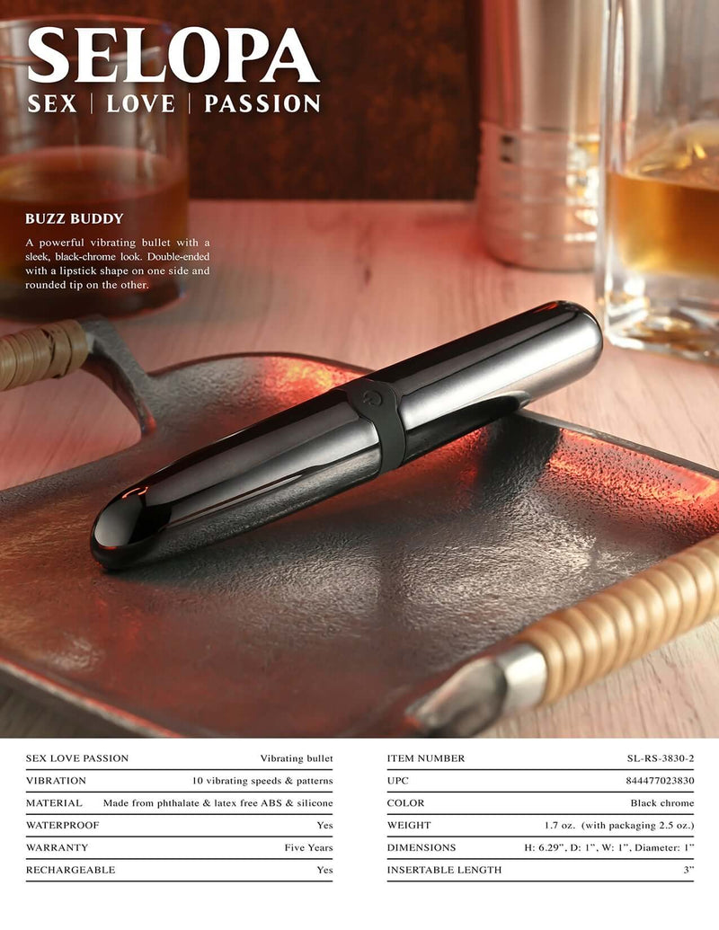 Selopa Buzz Buddy dual-ended bullet vibrator with lipstick-shaped and rounded tips on a tray, elegant black chrome finish