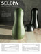 Selopa Kingpin ergonomic black and green stroker with vibrating ring by Evolved Novelties on display
