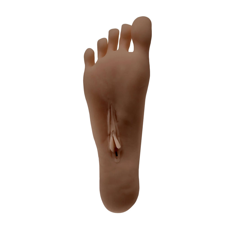Realistic foot stroker from Zero Tolerance Pussy Footin Dark Stroker Combo with lifelike toes and smooth heel for foot fetish pleasure.