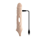 Zero Tolerance Big Boy Extender in light skin tone with USB charging cable for enhanced pleasure and size.