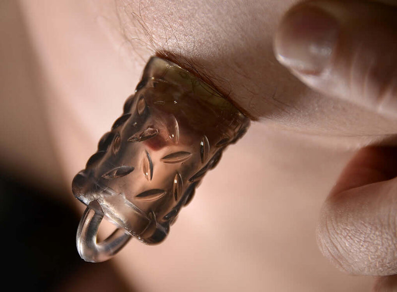 Close-up of Gripper Nipple Sucker Oxballs Smoke on a nipple, showing detailed design and small handle for easy gripping.