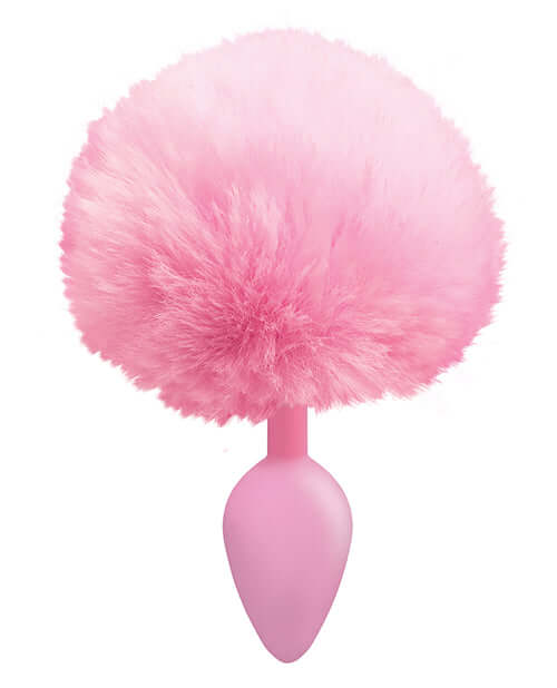 Pink silicone bunny tail butt plug with soft faux fur by The Nines Cottontails.
