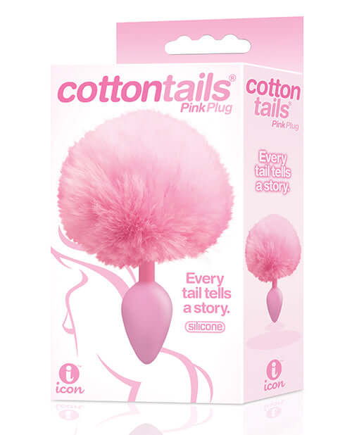 The Nines Cottontails Silicone Bunny Tail Butt Plug in Pink with soft faux fur displayed in packaging from Icon Brands
