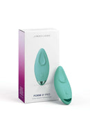 JimmyJane Form 3 Pro Teal Green Vibrator with packaging, ergonomically designed for precise clitoral and labia stimulation.