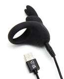 Happy Rabbit Rechargeable Rabbit Cock Ring in black with USB charging cable for enhanced pleasure and powerful vibrations.
