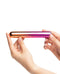 Person holding Sensuelle Aluminum Rumba Double Motor Ombre Multicolor Vibrator in hand