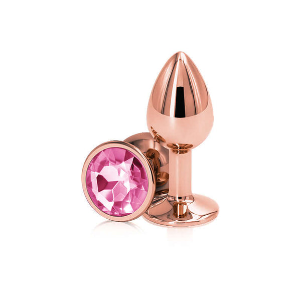 Rose gold anal plug with pink gem base, crafted from lightweight aluminum for elegance and comfort.