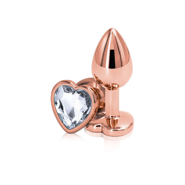 Elegant rose gold heart small clear butt plug design for intimate pleasure and aesthetics by NS Novelties.