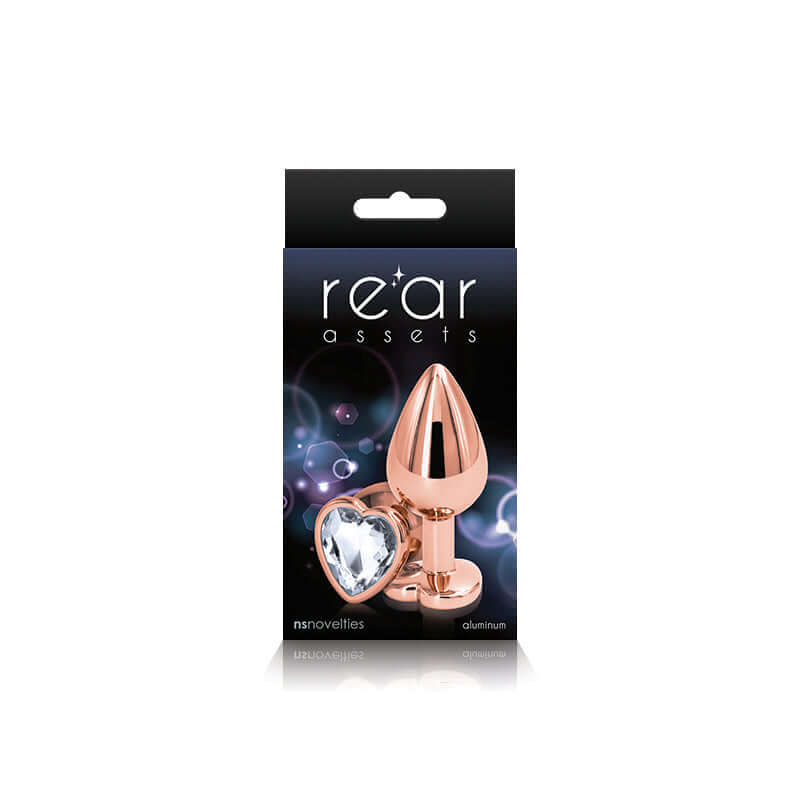 Rear Assets Rose Gold Heart Medium Clear Butt Plug packaging, featuring a sleek aluminum design for visual and sensual pleasure.