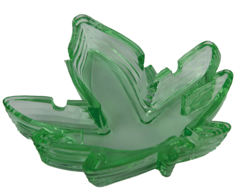 Grass-green plastic ashtray shaped like a cannabis leaf, perfect for adding a fun and novelty touch to adult gatherings and parties.