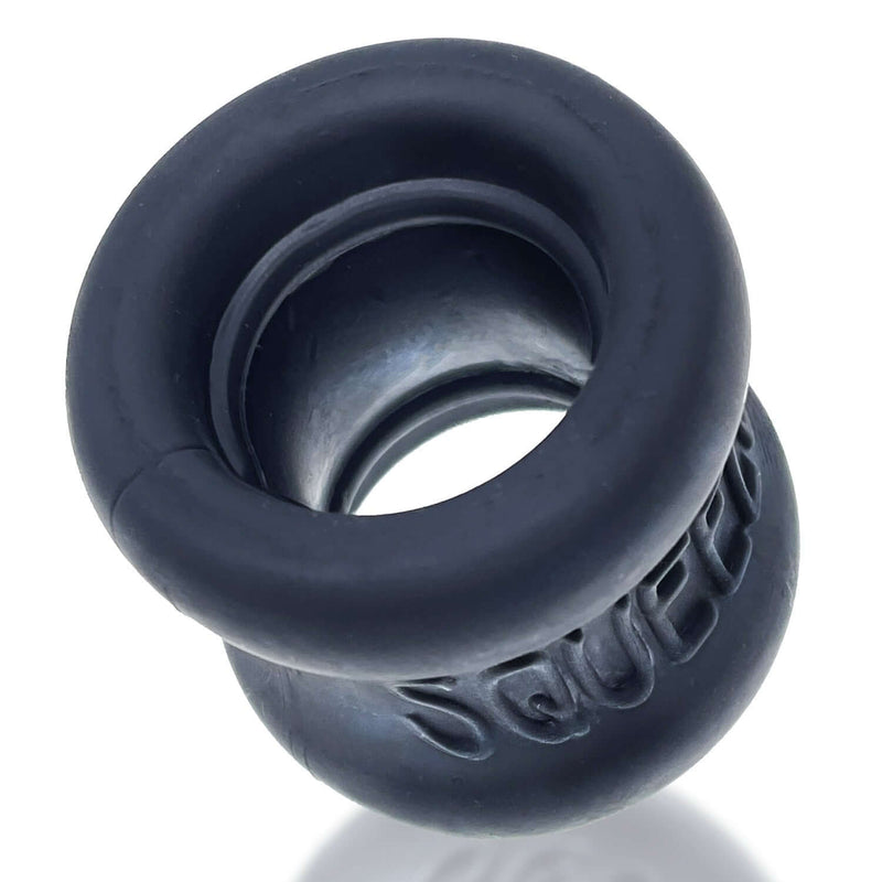 Squeeze Ball Stretcher Night by Oxballs in hourglass shape made from soft FlexTPR material, designed for comfortable grip and support.