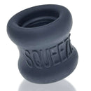 Soft and stretchy hourglass-shaped Oxballs Squeeze ball stretcher in black, made from super soft FlexTPR for comfortable wear.