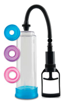 Pipedream Pump Worx Cock Trainer Pump System with Sure-Grip pump trigger and multiple PVC openings in blue, purple, and pink.