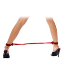 Red silk rope love cuffs on ankles for easy Japanese bondage beginners.